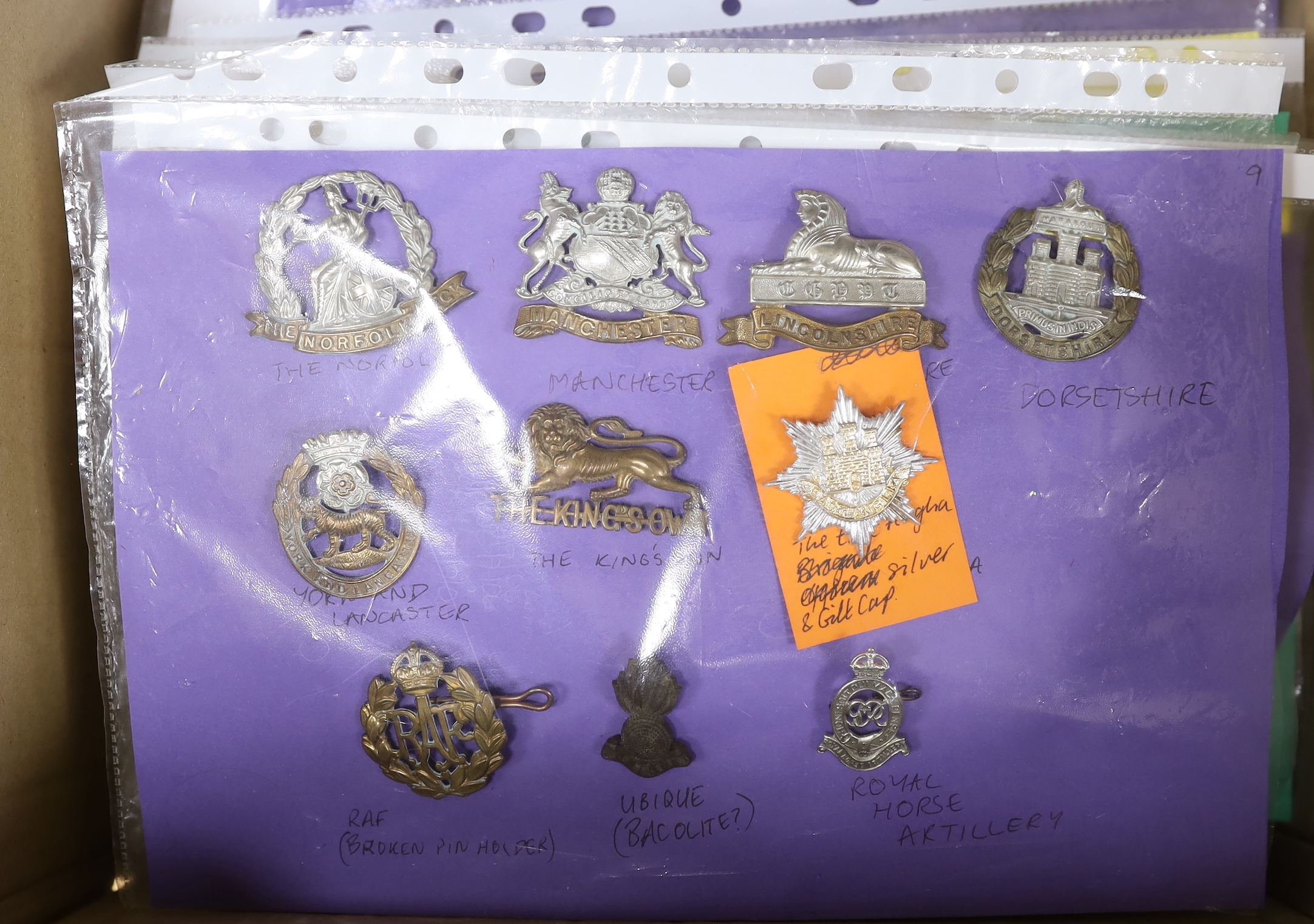 A collection of c.100 British military cap badges including South Staffordshire and Royal Artillery, Scottish regiments etc.